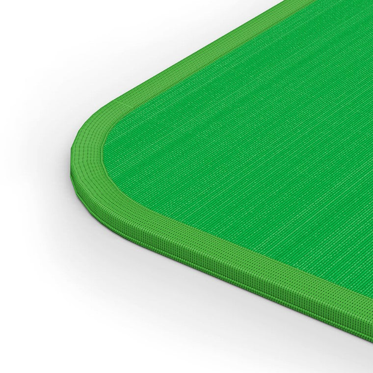 Närbild på grön musmatta